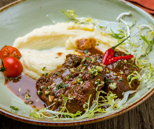 Gîte confit, sauce au porto et grenailles