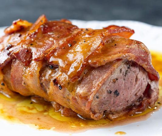 Filet mignon de porc, crème à l'ail et légumes de saison