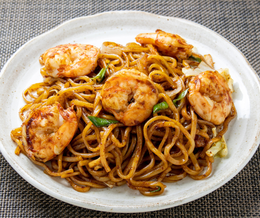 Crevettes sauce au jus d'orange et spaghettis